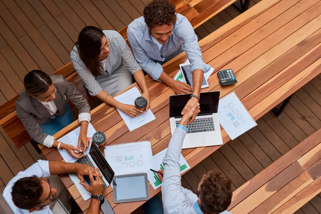 high angle shot of businesspeople shaking hands